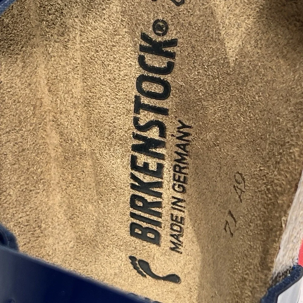 Birkenstock Women’s Navy Patent Rio Sandals with Red Sole
